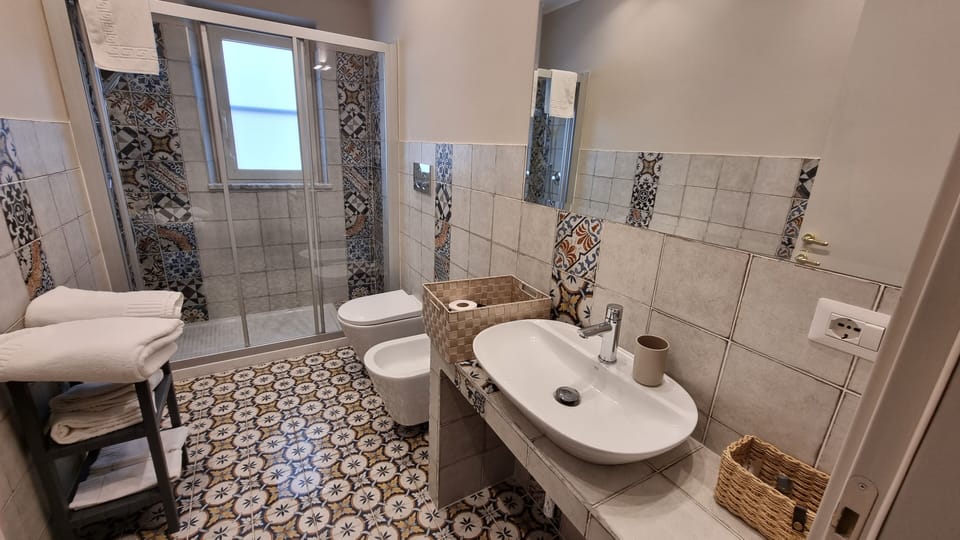 Comfort Room, Courtyard View | Bathroom | Free toiletries, hair dryer, slippers, bidet