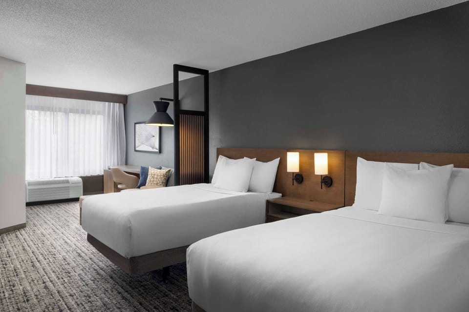 Premium bedding, down comforters, in-room safe, desk