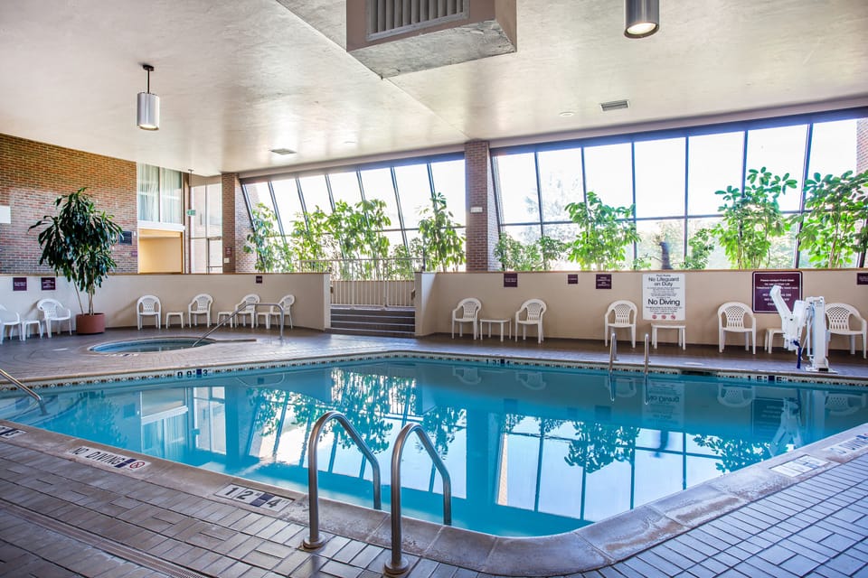 Indoor pool, seasonal outdoor pool, pool umbrellas, sun loungers