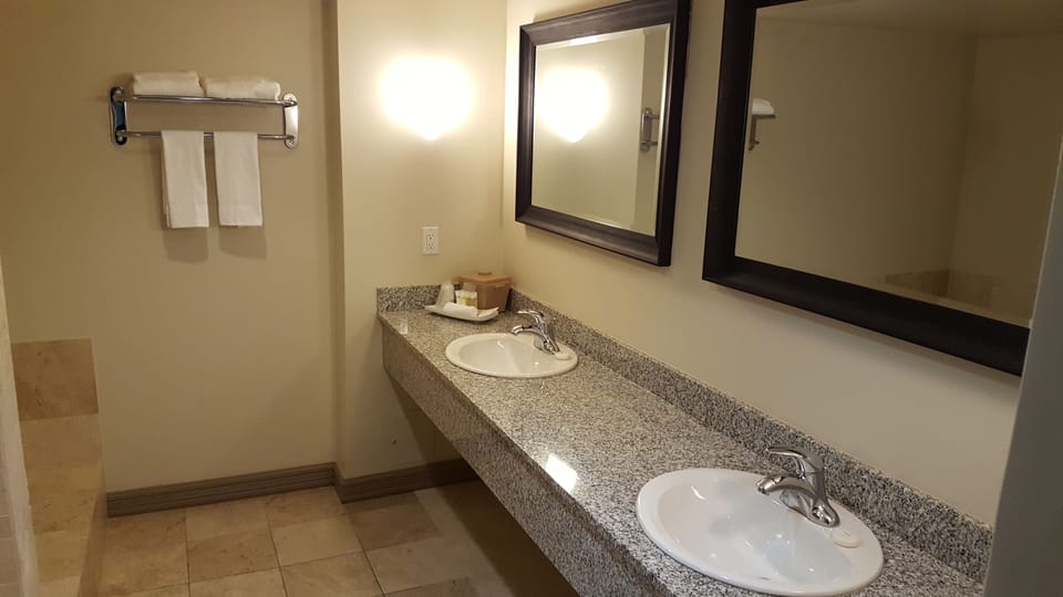 One Bedroom Suite (No pets allowed) | Desk, blackout drapes, iron/ironing board, free cribs/infant beds