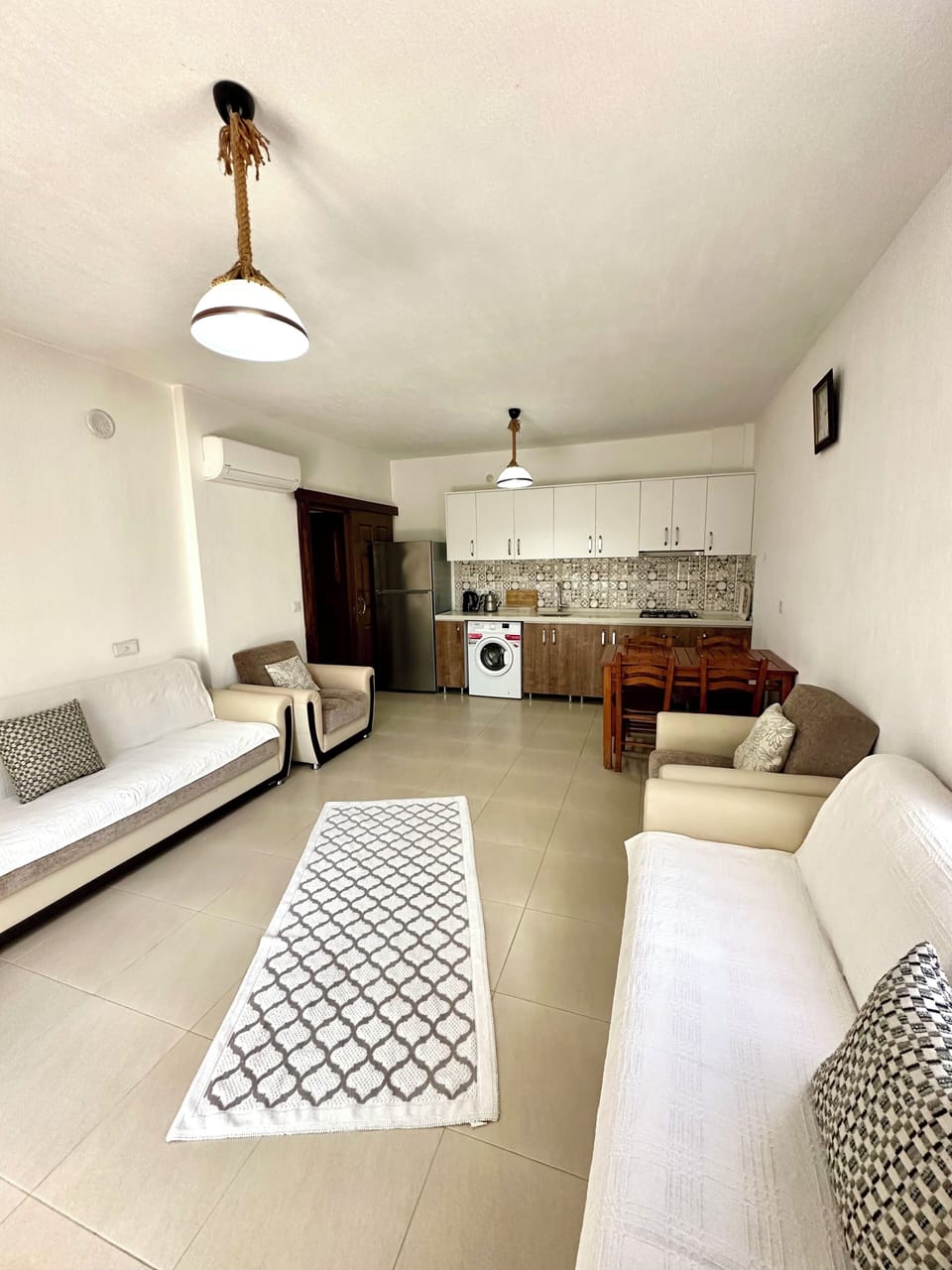 Economy Apartment, Garden View | Living area | 70-inch LCD TV with satellite channels