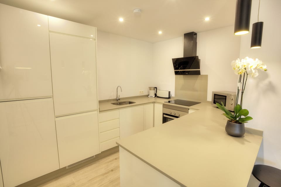 Apartment, 2 Bedrooms | Private kitchen | Oven, dishwasher, coffee/tea maker, toaster
