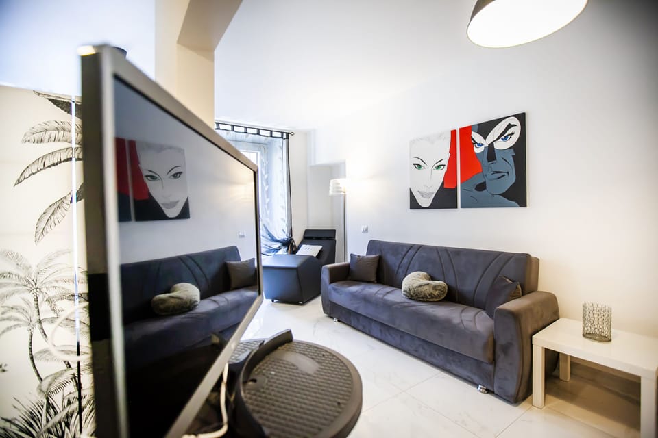 Classic Apartment | Living area | Flat-screen TV