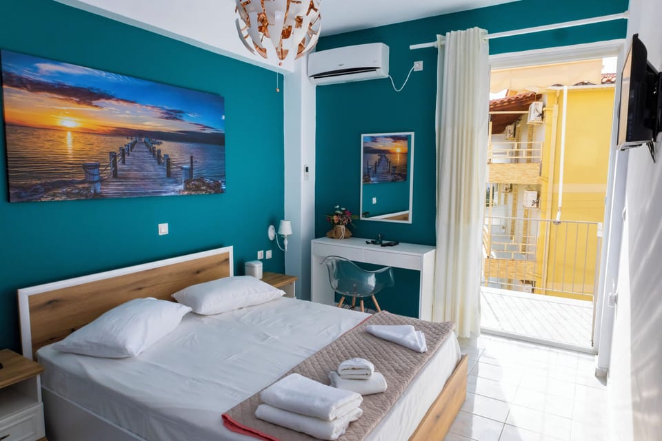 Elite Double Room, Sea View | Bathroom | Shower, rainfall showerhead, hair dryer, slippers