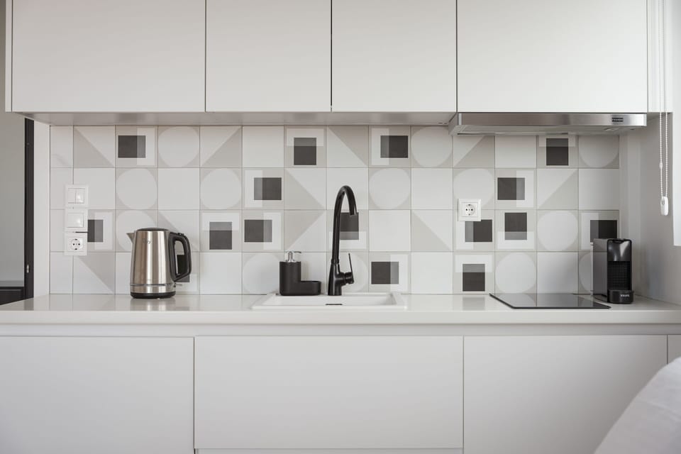 Panoramic Suite | Private kitchenette | Fridge, microwave, toaster, eco-friendly cleaning products