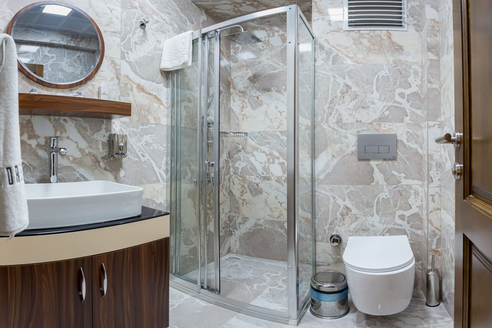 Comfort Room, City View | Bathroom | Free toiletries, hair dryer, slippers, bidet