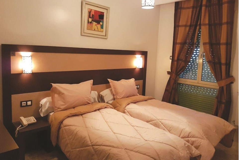 Minibar, desk, blackout drapes, WiFi (free)