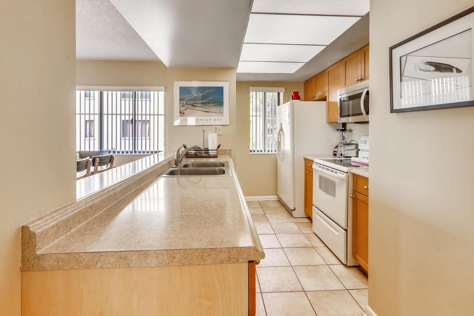 Condo, 1 King Bed (Land's End 10-205 Beach Front) | Private kitchen | Oven, toaster