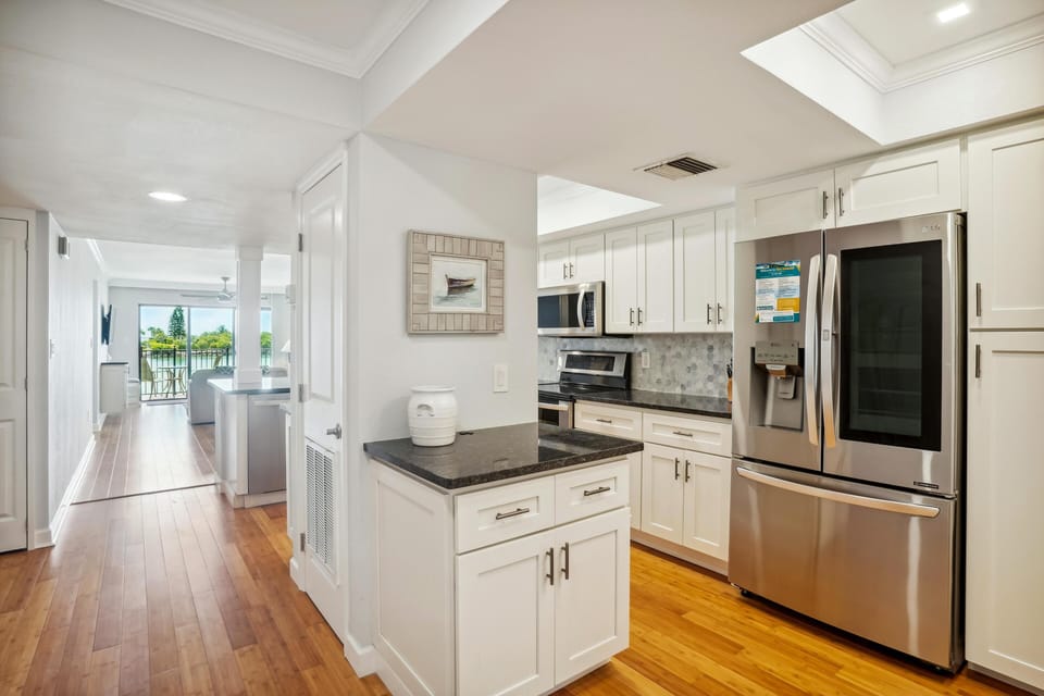 Condo, Multiple Beds (Land's End 5-204 Gulf-Bay Front - Pre) | Private kitchen | Oven, toaster
