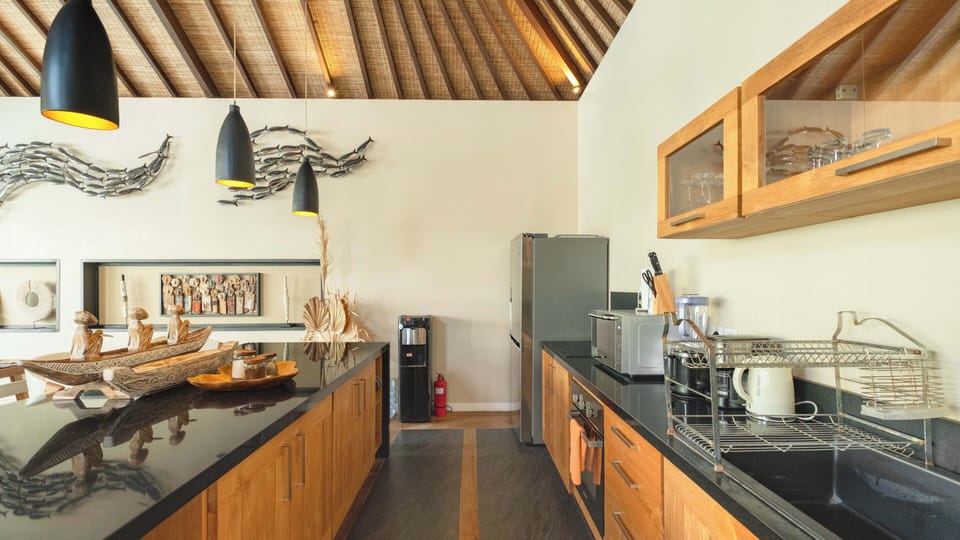 Villa | Private kitchen | Highchair, dining tables