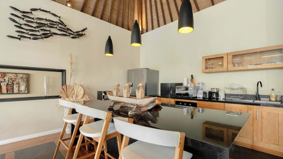 Villa | Private kitchen | Highchair, dining tables