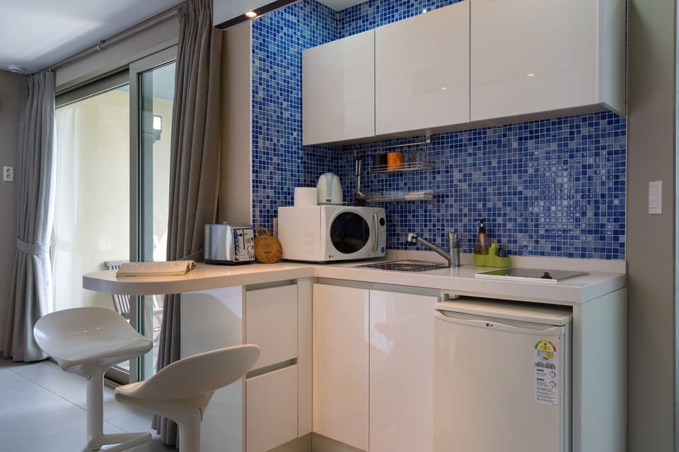 Standard Room | Private kitchen | Fridge, microwave