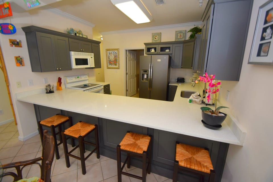 Condo, Multiple Beds, Balcony, Pool View (Spinnaker Pointe 1B) | Private kitchen | Coffee/tea maker