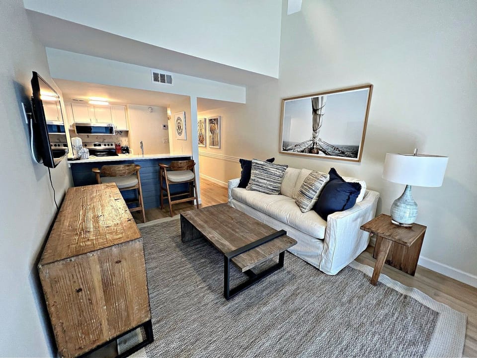 Condo, 1 Queen Bed with Sofa bed, Balcony, Pool View (Sugar Beach 306) | Living area