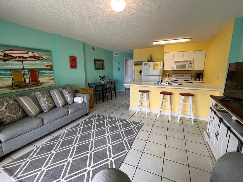Condo, Multiple Beds, Balcony, Pool View (Tradewinds 507) | Living area