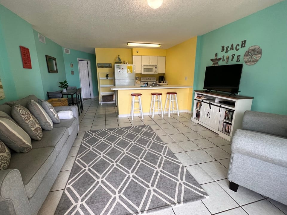 Condo, Multiple Beds, Balcony, Pool View (Tradewinds 507) | Living area