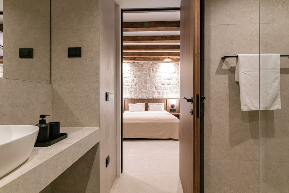 Shower, rainfall showerhead, hair dryer, towels
