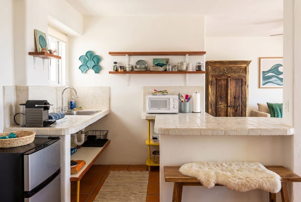 Premium Suite, Patio, Partial Ocean View | Private kitchen | Coffee/tea maker, shared fridge, microwave, toaster