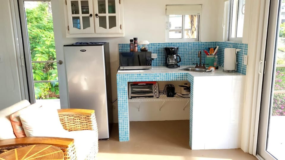 Family Double Room | Private kitchen | Shared fridge, microwave, coffee/tea maker, toaster
