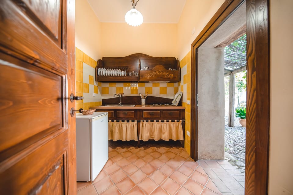 Apartment, 1 Bedroom | Private kitchen | Fridge, stovetop, cookware/dishes/utensils