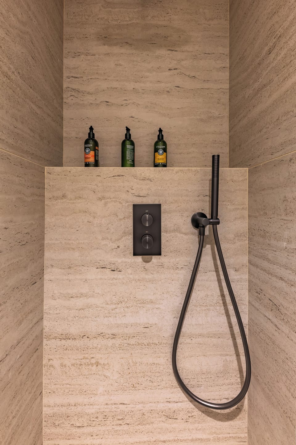 Designer toiletries, hair dryer, bidet, towels