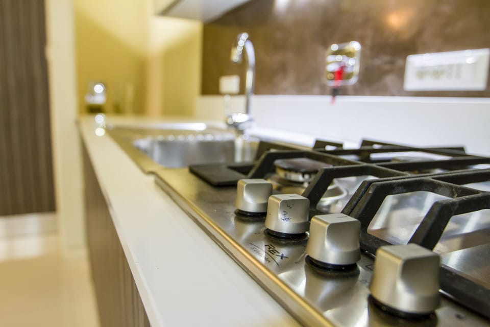 Superior Apartment, Courtyard Area | Private kitchen | Full-size fridge, microwave, oven, stovetop