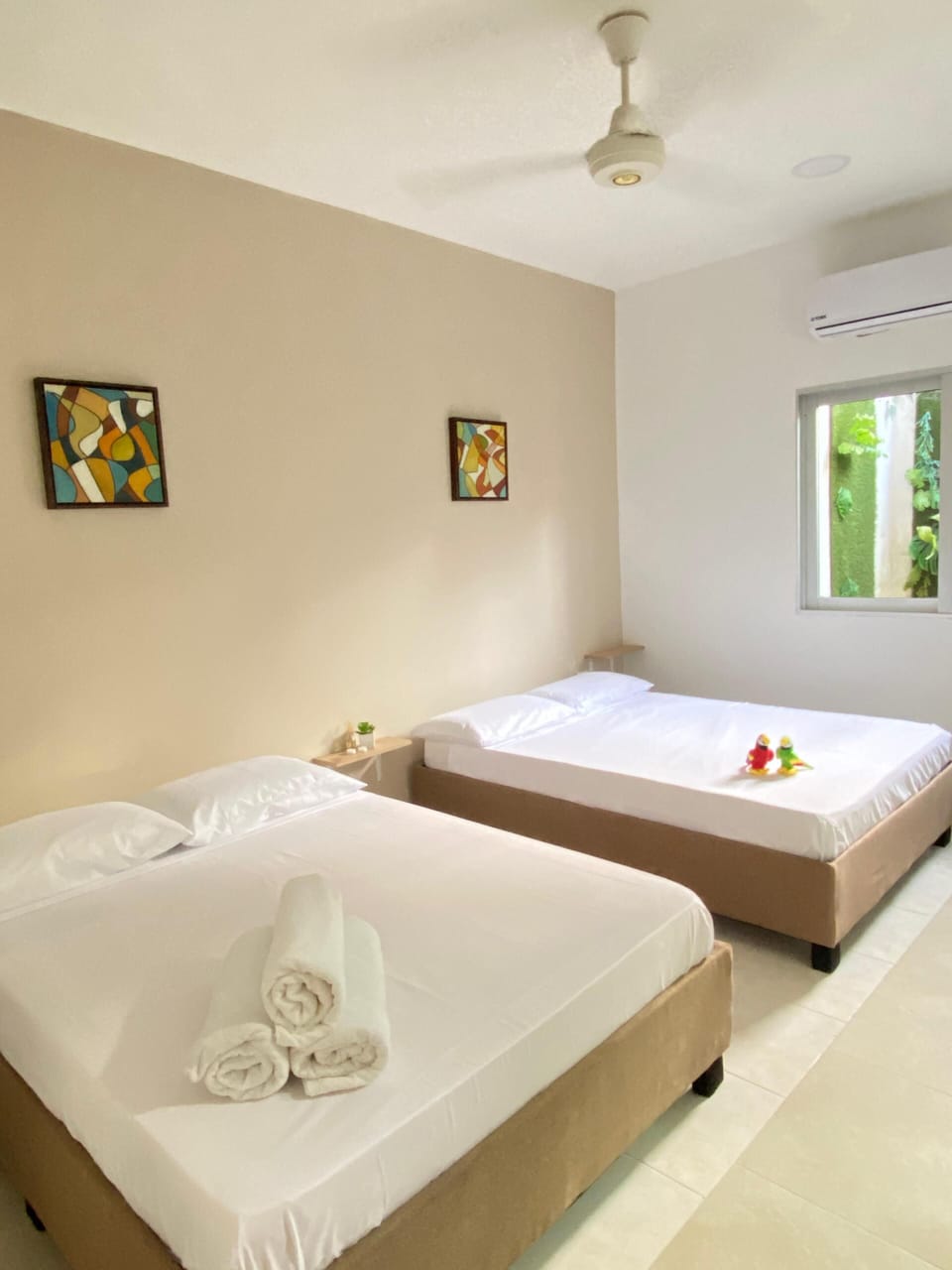 Comfort Quadruple Room, Courtyard View | Down comforters, blackout drapes, free WiFi, bed sheets