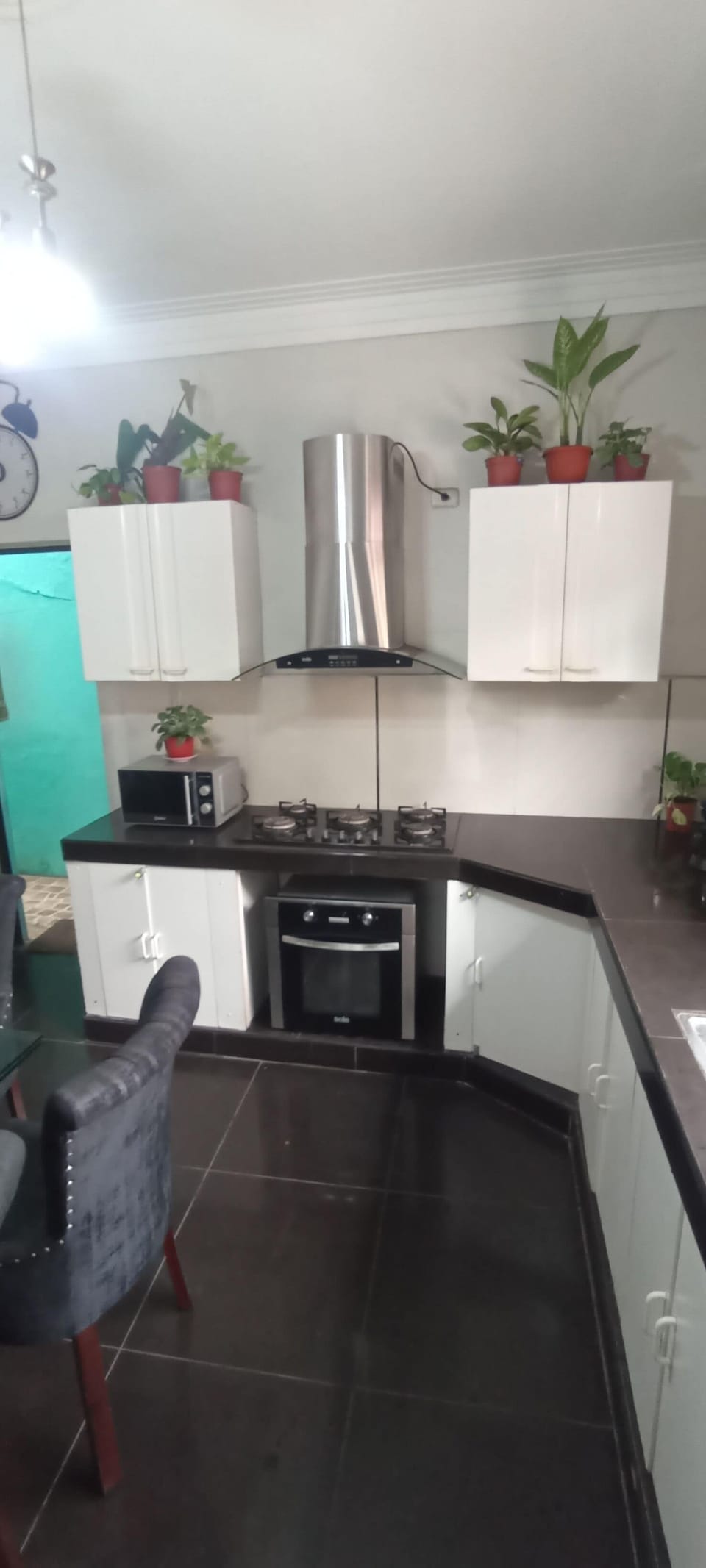 Shared fridge, shared microwave, blender, cookware/dishes/utensils