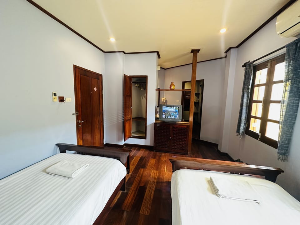 Deluxe Twin Room | Premium bedding, down comforters, individually furnished, desk