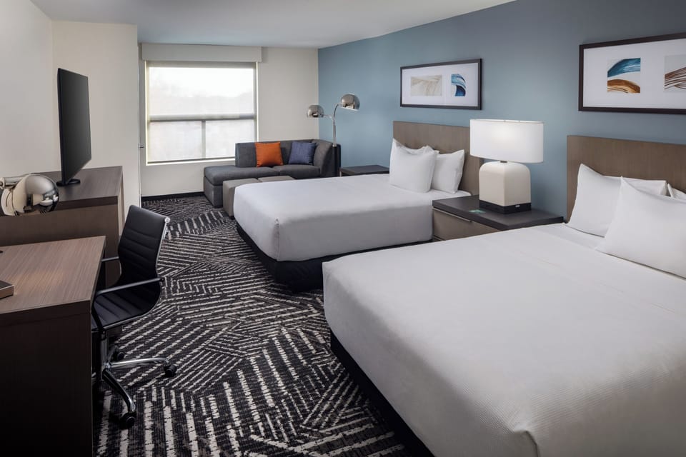 Room, 2 Queen Beds (Den) | In-room safe, desk, laptop workspace, blackout drapes