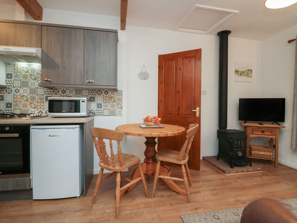 Fridge, electric kettle, toaster, cookware/dishes/utensils