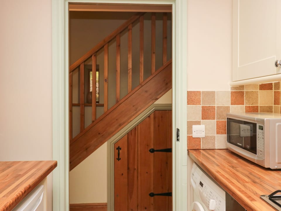 Fridge, dishwasher, electric kettle, cookware/dishes/utensils