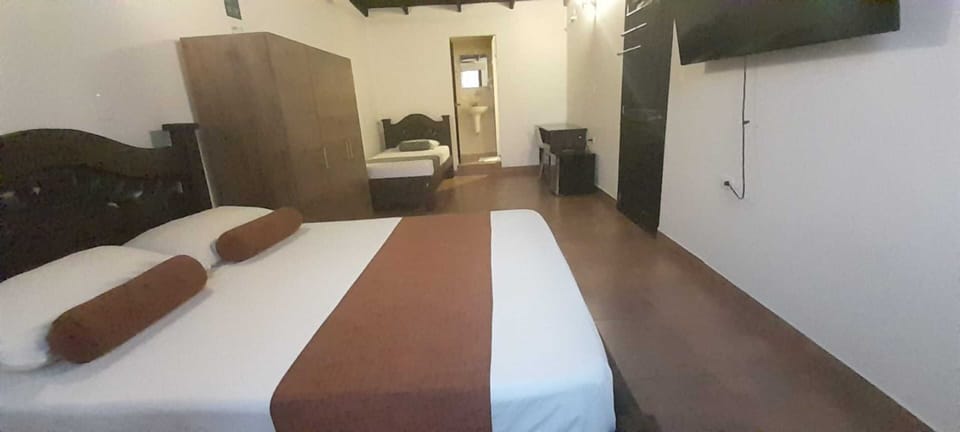Economy Triple Room | Hypo-allergenic bedding, desk, free WiFi, bed sheets