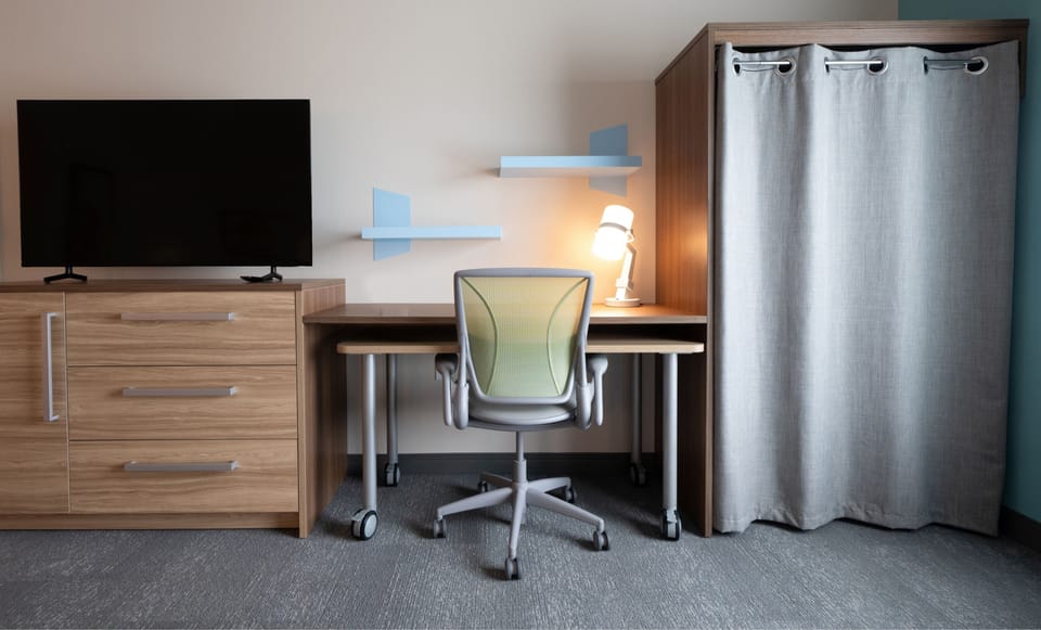 Laptop workspace, free WiFi, bed sheets