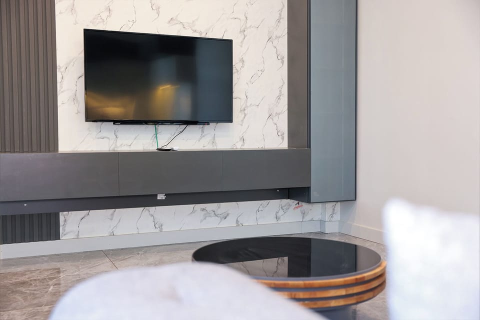 Family Condo | Premium bedding, desk, laptop workspace, blackout drapes