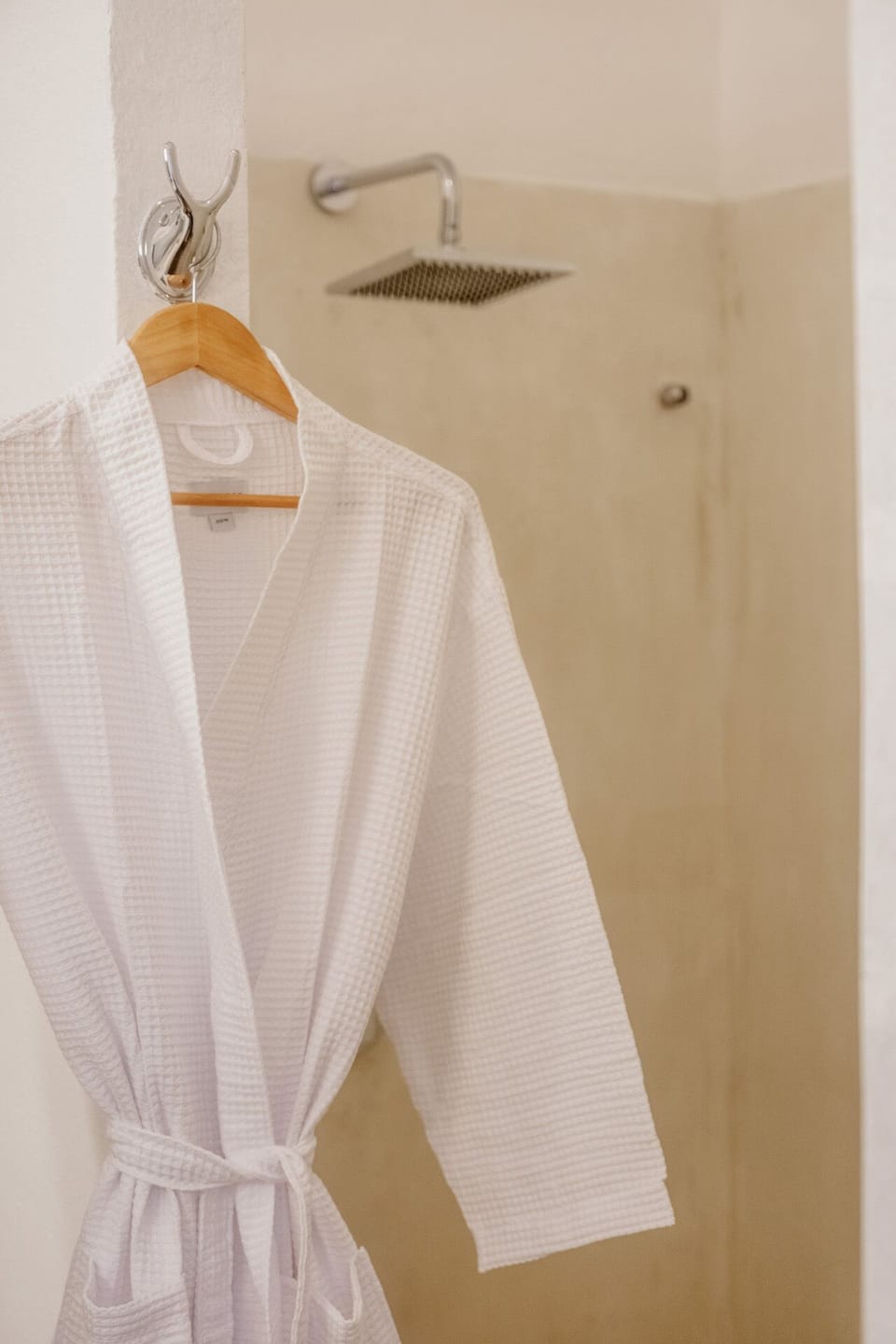 King Suite | Bathroom | Shower, rainfall showerhead, hair dryer, bathrobes