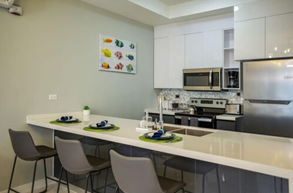 Comfort Apartment | Private kitchen | Full-size fridge, microwave, oven, electric kettle