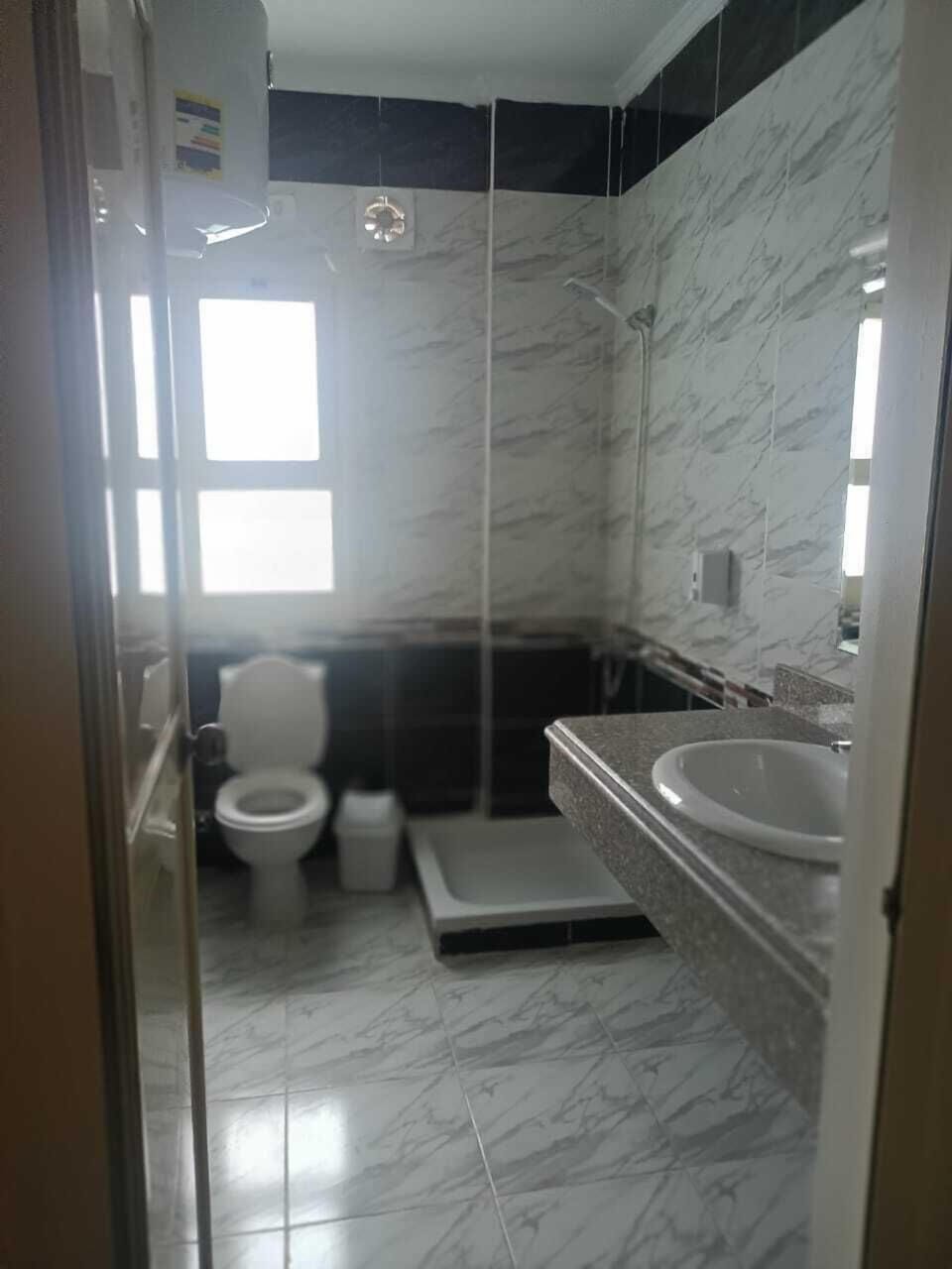 Premium Triple Room, Garden View | Bathroom | Shower, rainfall showerhead, slippers, towels