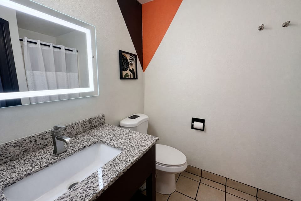 Shower, eco-friendly toiletries, hair dryer, towels