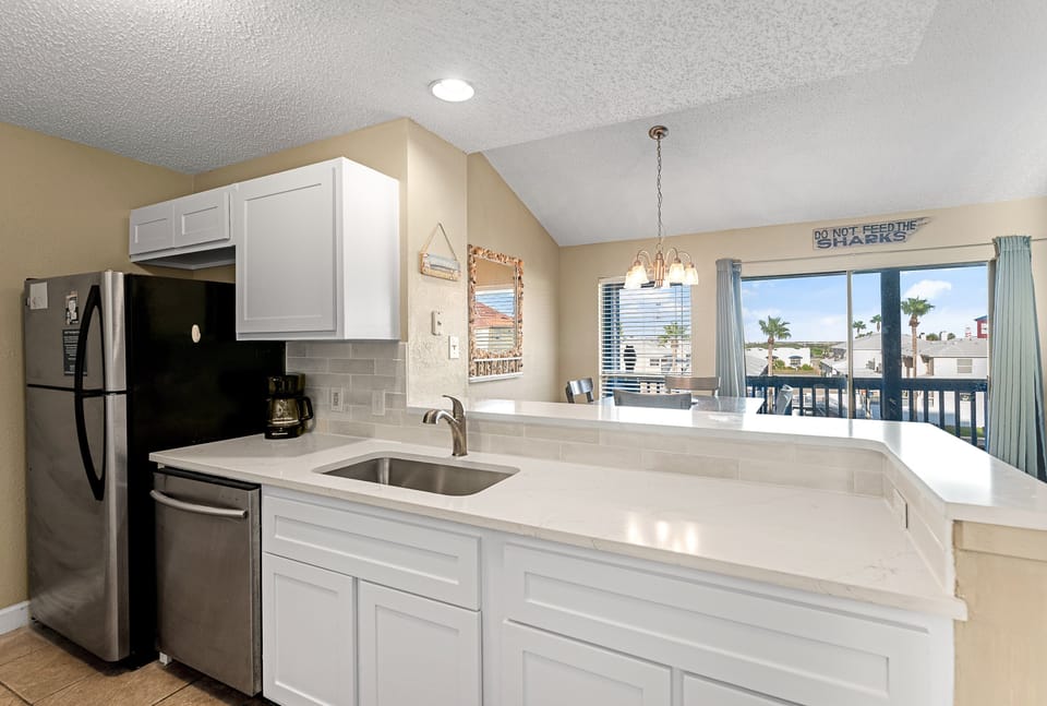 Condo, Multiple Beds, Hot Tub (Spinnaker 317) | Private kitchen | Coffee/tea maker, dining tables