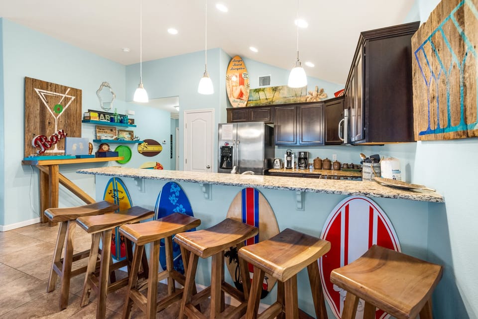 House, Multiple Beds, Pool Access, Ocean View (Boogie Board Bungalow) | Private kitchen | Coffee/tea maker, dining table