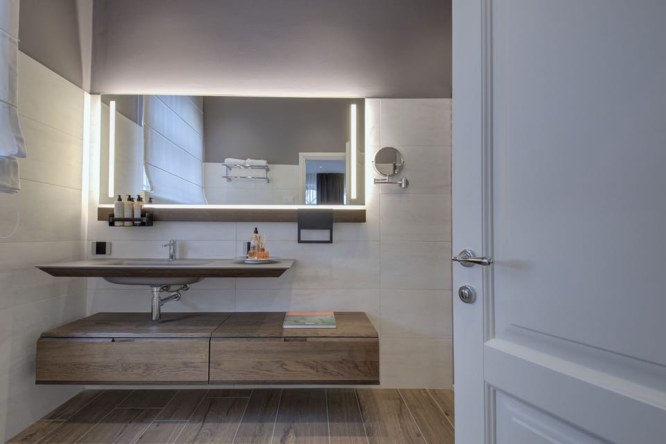 Luxury Suite, 2 Bedrooms | Bathroom | Free toiletries, hair dryer, bathrobes, slippers