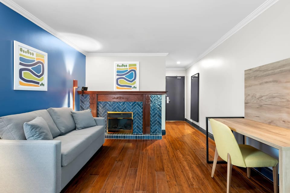 Suite, 1 King Bed, Non Smoking | Premium bedding, down comforters, blackout drapes, iron/ironing board