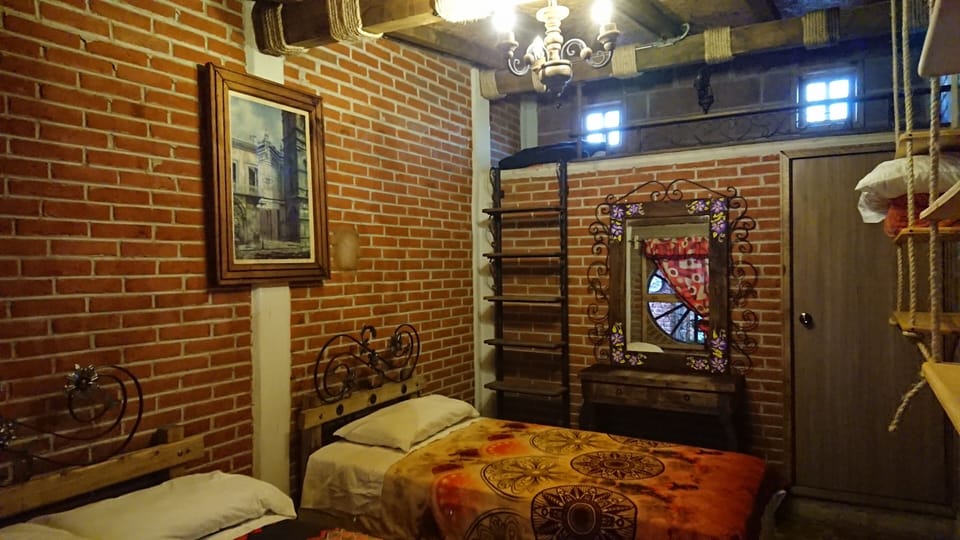 Family Room, Courtyard View | Individually decorated, free WiFi, bed sheets
