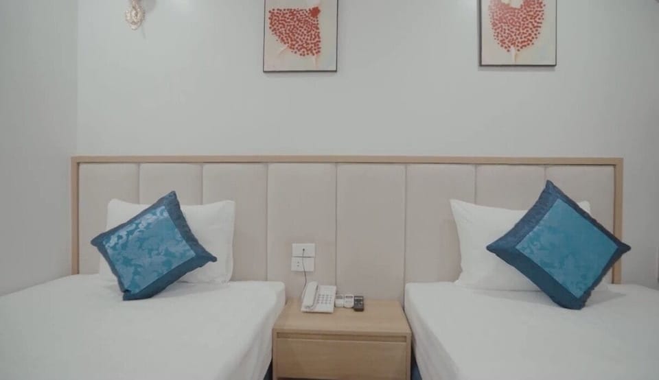Family Triple Room | Free minibar items, free WiFi, bed sheets