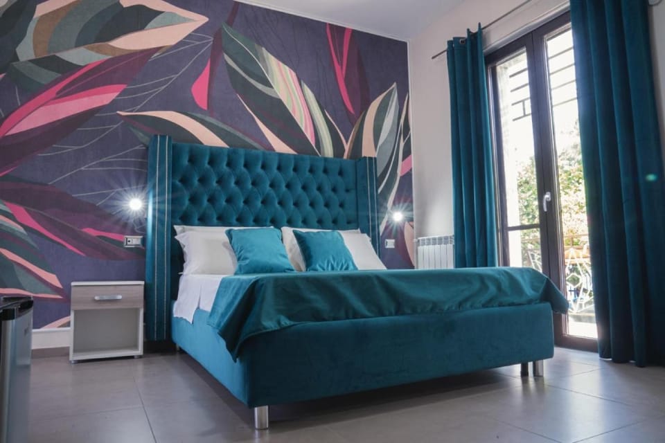 Family Room | Minibar, desk, laptop workspace, WiFi (free)