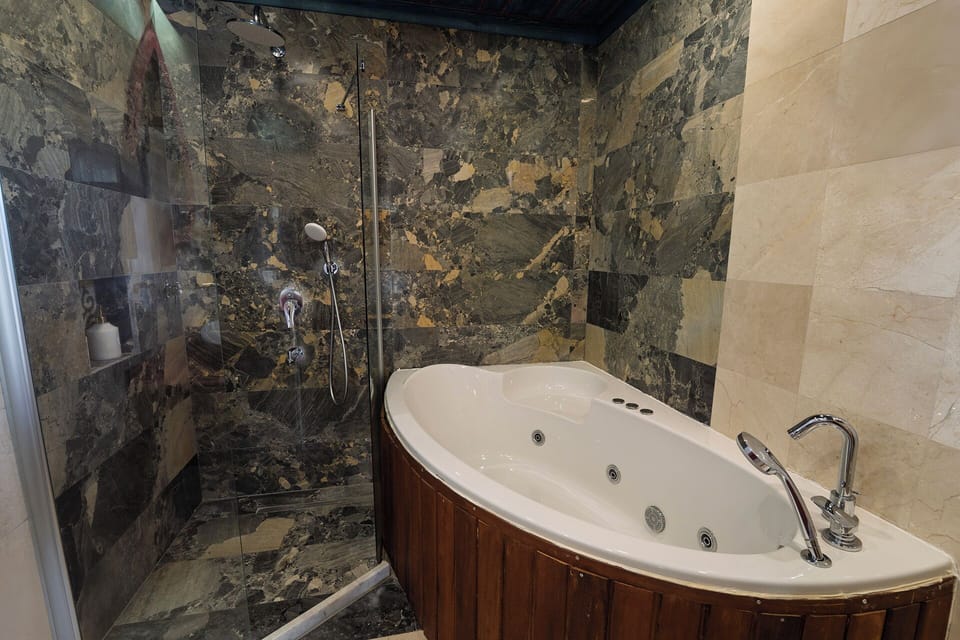 JUNIOR SUITE WITH BALCONY | Bathroom | Hair dryer, bathrobes, slippers, heated floors