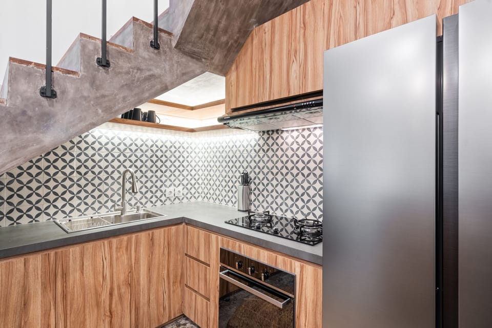 Villa | Private kitchen | Fridge, cookware/dishes/utensils, cleaning supplies, dining tables