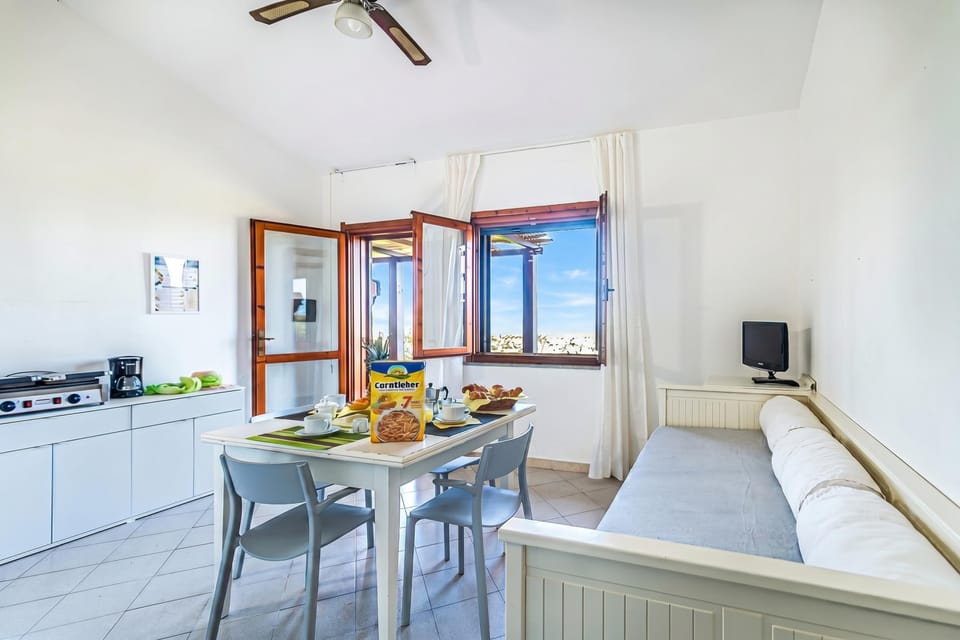 Standard Townhome, 2 Bedrooms, Terrace (2 Le Perle Di Stintino) | Dining
