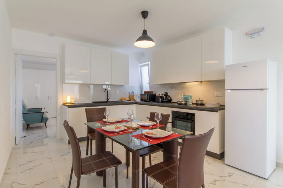 Family Apartment, Multiple Bedrooms, 2 Bathrooms (A Sunny Penthouse Modern 2 bdr -) | Private kitchen | Fridge, microwave, oven, stovetop